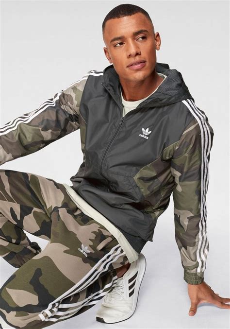 adidas windbreaker camouflage herren|Adidas cropped windbreaker dick's.